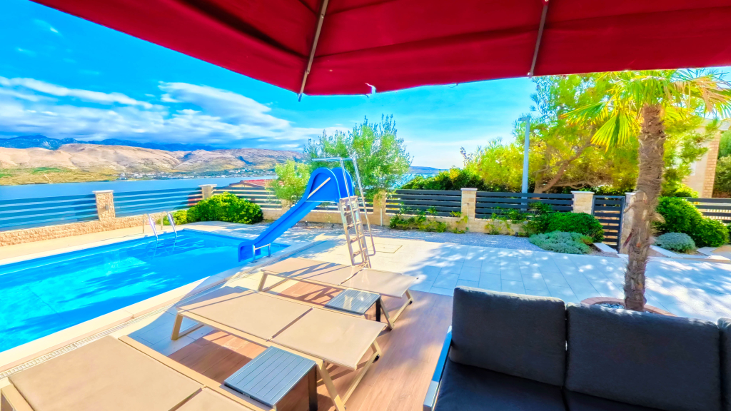 Luxury villa terrace and infinity pool overlooking the Adriatic in Pag