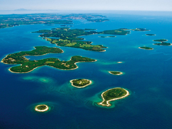 Aerial perspective of Croatia’s Adriatic islands with crystal-clear waters and untouched coastlines