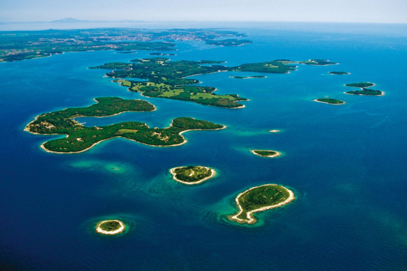 Aerial perspective of Croatia’s Adriatic islands with crystal-clear waters and untouched coastlines